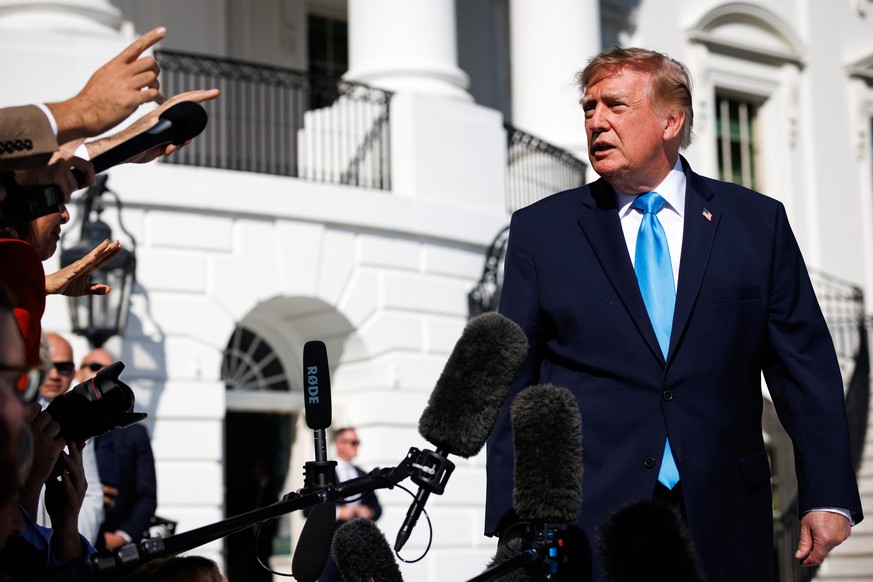 epa13283585 US President Donald Trump speaks to reporters on the South Lawn before departing the White House in Marine One in Washington, DC, USA, 05 October 2026. President Trump will deliver remarks ...