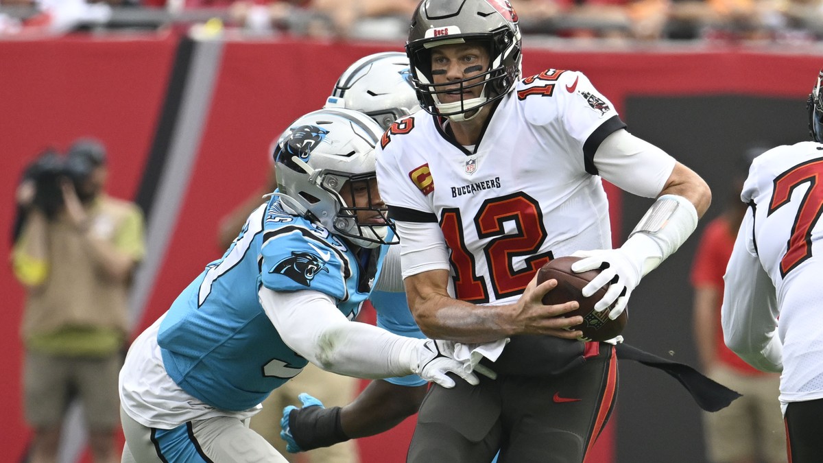 Tampa Bay Buccaneers quarterback Tom Brady is sacked by Carolina Panthers defensive end Yetur Gross-Matos during the first half of an NFL football game between the Carolina Panthers and the Tampa Bay  ...