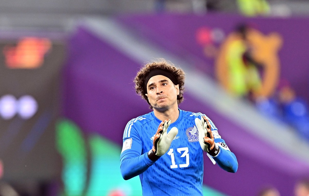 epa10321097 Goalkeeper Guillermo Ochoa of Mexico reacts after the FIFA World Cup 2022 group C soccer match between Mexico and Poland at Stadium 947 in Doha, Qatar, 22 November 2022. EPA/Noushad Thekka ...
