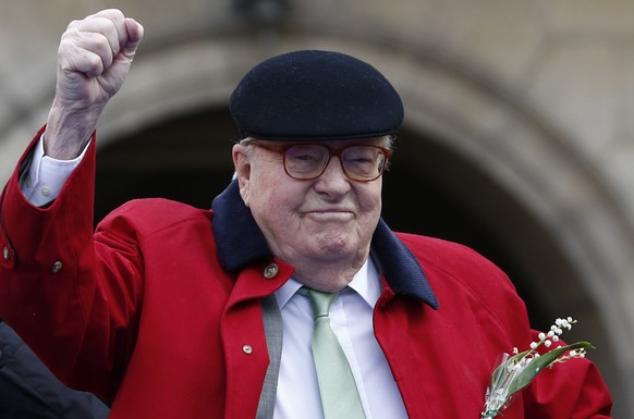 FILE - In this file photo dated Monday May 1, 2017, former far-right National Front party leader Jean-Marie Le Pen clenches his fist at the statue of Joan of Arc in Paris. France&#039;s far-right Nati ...