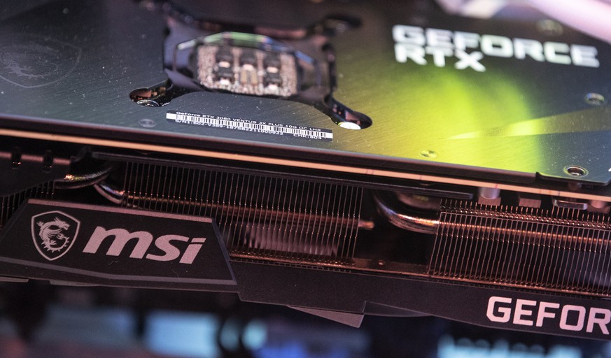 epa10566989 An MSI GeForce RTX 3080 Ventus is on display running within a gamer desktop tower during the DreamHack Gaming Festival in San Diego, California, USA, 09 April 2023. EPA/ETIENNE LAURENT ATT ...