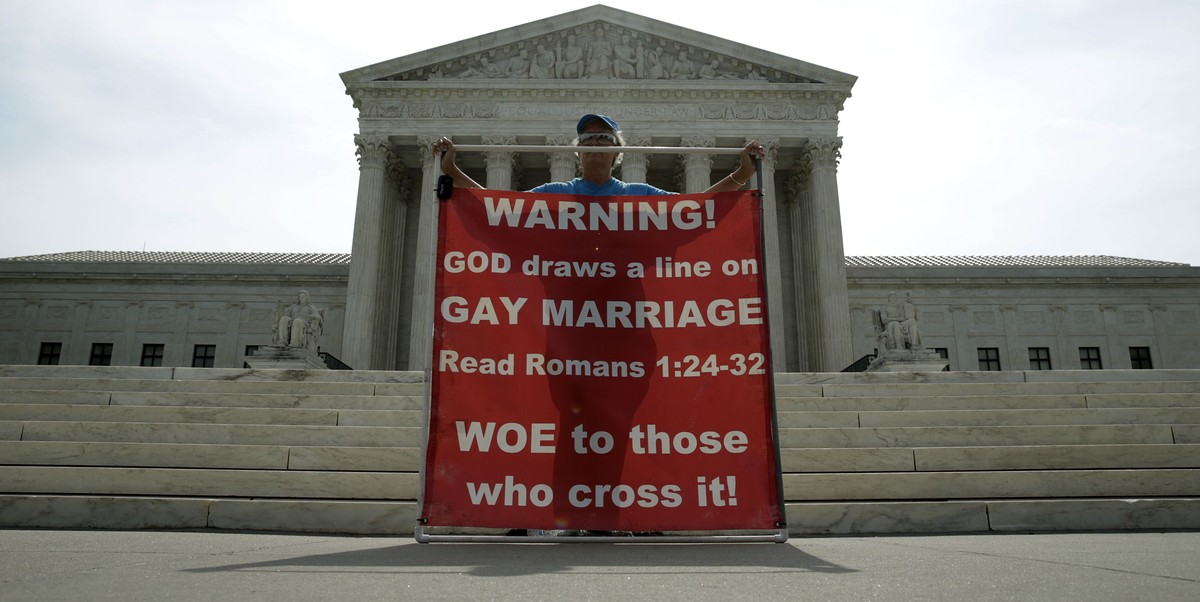 Christine Weick protests against gay marriage in front of the U.S. Supreme Court in Washington June 8, 2015. A ruling on Obergefell v. Hodges, and whether the U.S. Constitution's guarantees of du ...
