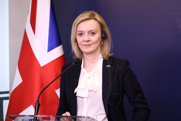 epa09872561 British Foreign Secretary Liz Truss and Polish Foreign Minister Zbigniew Rau (not pictured) during a press conference after their meeting at the headquarters of the Polish Foreign Ministry ...