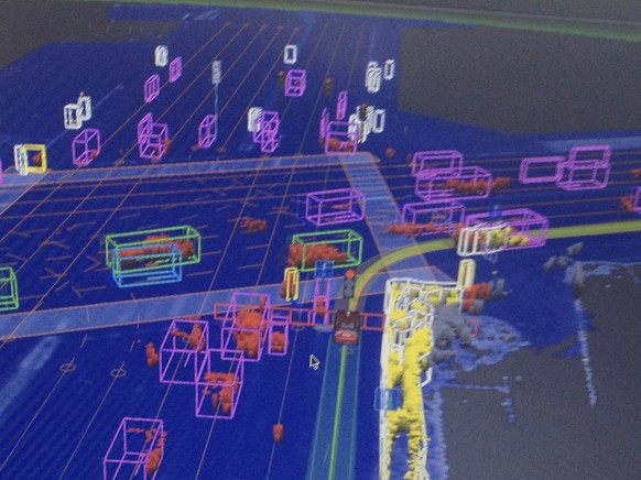 Ansichten eines Autos: Auf einem Laptop-Bildschirm ist zu sehen, wie das Google-Car die Welt betrachtet. Eine Kombination aus Laser, Radar und Kamerasensoren erzeugt ein dreidimensionales Bild in alle ...