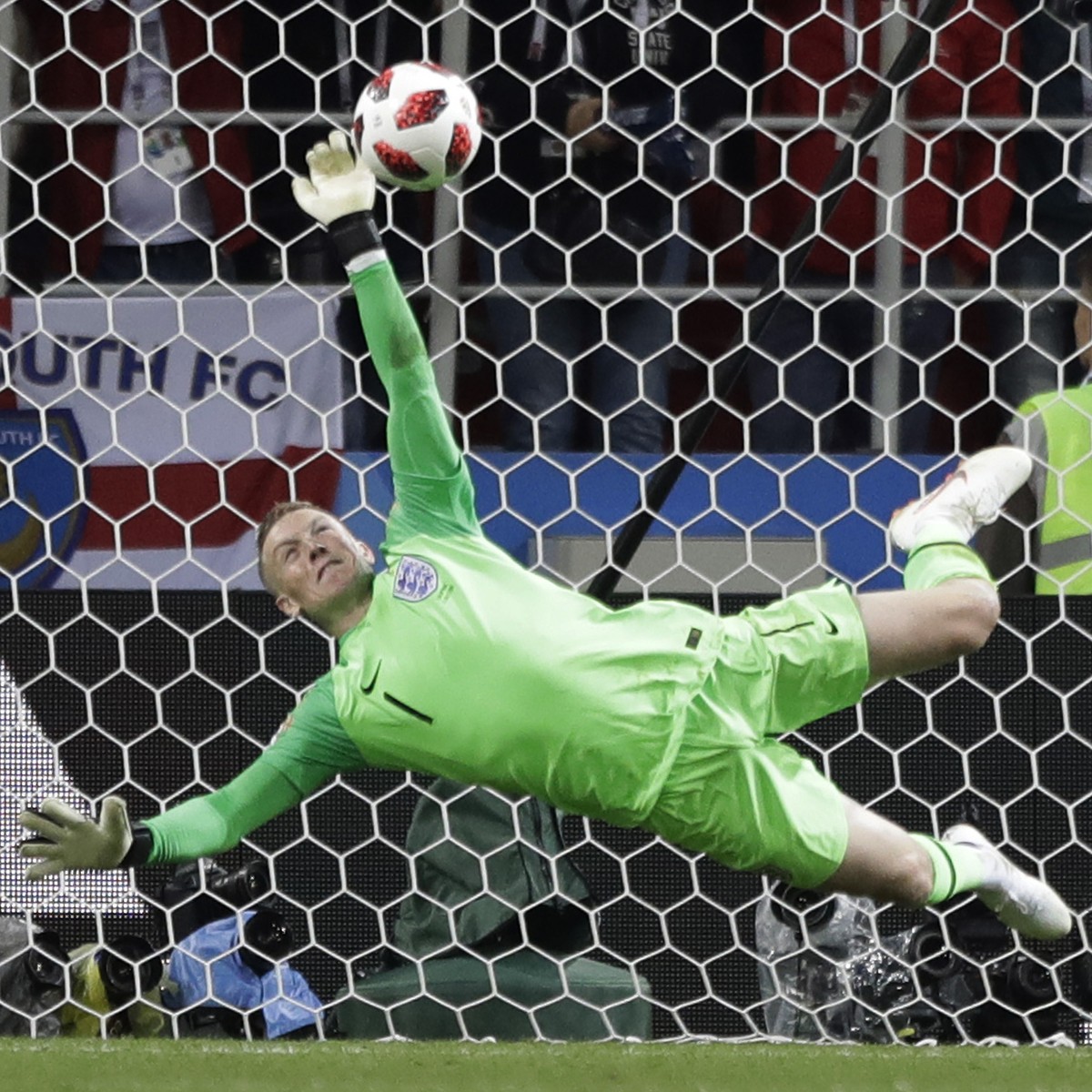 England goalkeeper Jordan Pickford saves a penalty during the round of 16 match between Colombia and England at the 2018 soccer World Cup in the Spartak Stadium, in Moscow, Russia, Tuesday, July 3, 20 ...