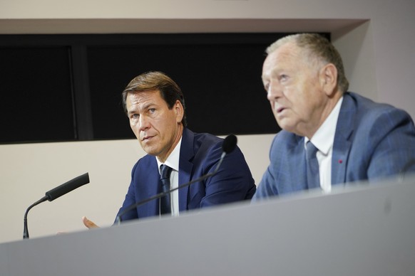 Lyon&#039;s President Jean-Michel Aulas, right, presents the new coach Rudy Garcia, left, during a press conference in Decines, near Lyon, central France, Tuesday, Oct. 15, 2019. Garcia signed a two-y ...