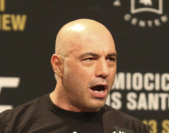 FILE - Joe Rogan is seen during a weigh-in before UFC 211 on Friday, May 12, 2017, in Dallas. Spotify has penned a new multi-year partnership deal with Rogan, Friday, Feb. 2, 2024. The enormously popu ...