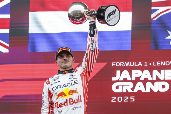 epa12013122 Red Bull Racing driver Max Verstappen of Netherlands celebrates on the podium after winning the 2025 Formula 1 Japanese Grand Prix at the Suzuka Circuit, Suzuka, Japan, 06 April 2025. EPA/ ...
