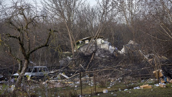 A view of the wreckage of the DHL cargo plane that crashed into a house near Vilnius, Lithuania, Monday, Nov. 25, 2024. (AP Photo/Mindaugas Kulbis)