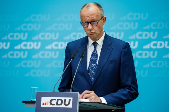 epa13135585 German Chancellor and Chairman of the Christian Democratic Union (CDU) Friedrich Merz looks on during a press conference at the CDU headquarters, in Berlin, Germany, 27 July 2026. EPA/CLEM ...