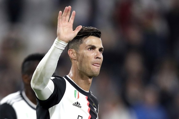 FILE - In this Oct. 19, 2019, file photo, Juventus&#039; Cristiano Ronaldo waves at the end of a Serie A soccer match between Juventus and Bologna, at the Allianz stadium in Turin, Italy. Ronaldo is h ...