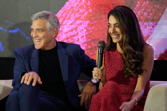 Couple George and Amal Clooney smile as they attend the Social Good Summit in Pasay City, Philippines, Sunday, Nov. 16, 2025. (AP Photo/Aaron Favila)
Philippines Clooney