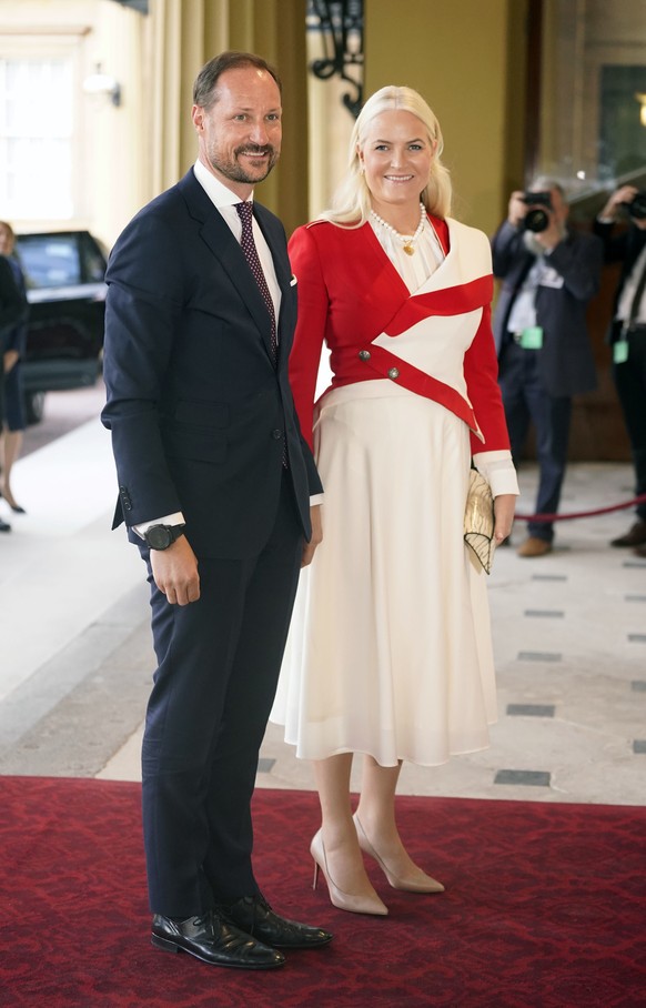 Haakon, Crown Prince of Norway and Mette-Marit, Crown Princess of Norway arrive for a reception at Buckingham Palace in London Friday May 5, 2023, hosted by King Charles III, for overseas guests atten ...