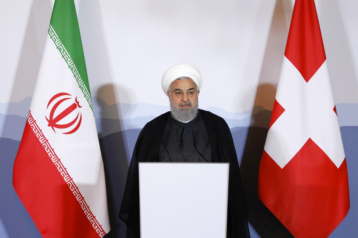 Iranian President Hassan Rohani speaks during an innovation and industry forum during Rohani's official visit to Switzerland in Bern, Tuesday, July 3, 2018. (KEYSTONE/Peter Klaunzer)