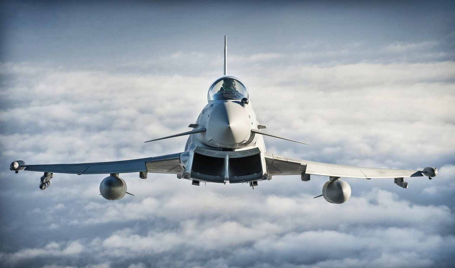 epa03989235 A photograph made available on 13 December 2013 by the British Ministry of Defence showing a British Royal Air Force (RAF) Typhoon of 1(F) Squadron on 13 October 2013. The British Ministry ...