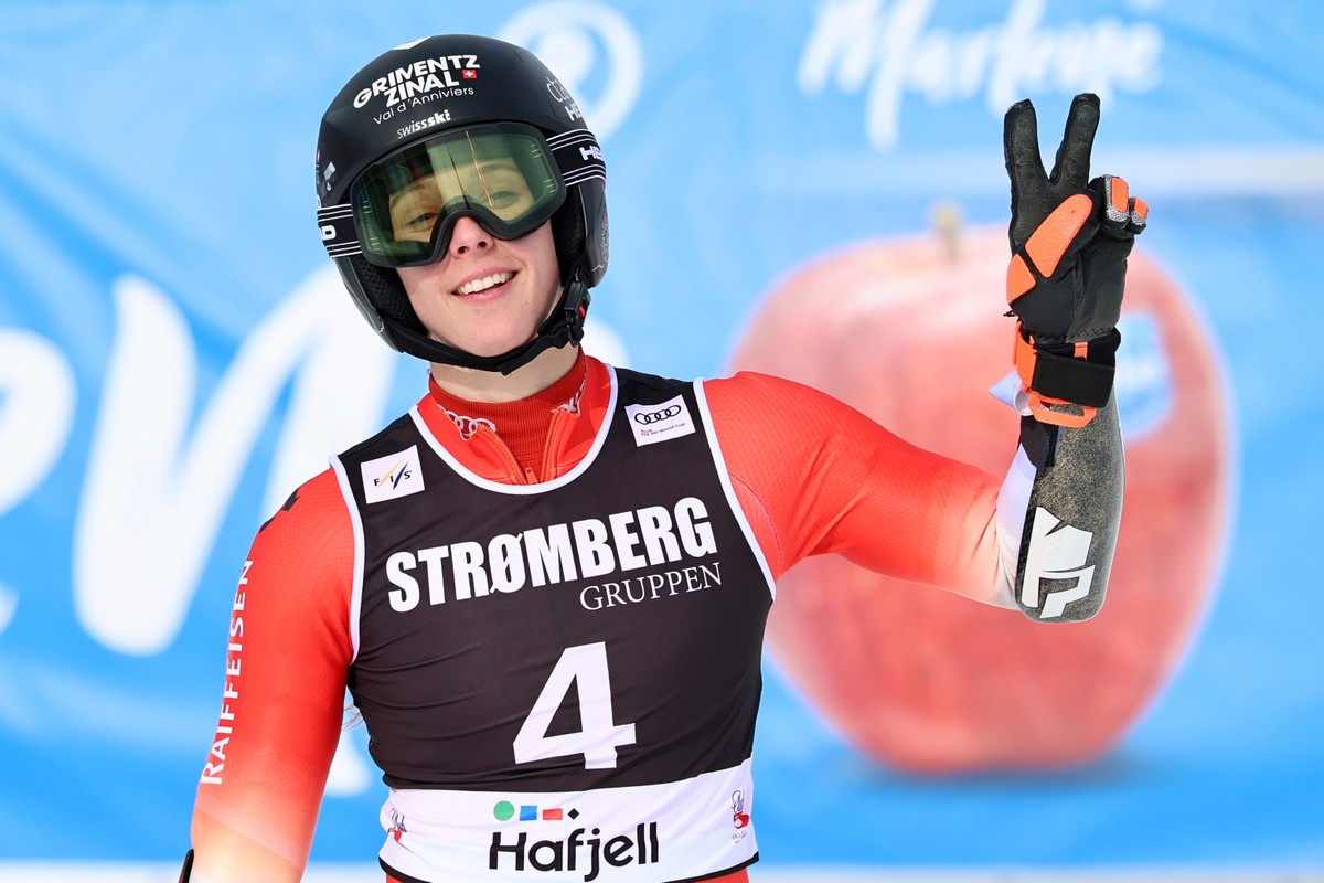 Switzerland's Camille Rast celebrates at the finish area of an alpine ski, women's giant slalom race, at the Lillehammer World Cup Finals, in Hafjell, Norway, Wednesday, March 25, 2026. (AP  ...