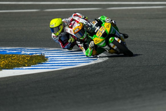 Switzerland&#039;s Noah Dettwiler of the CIP Green Power steers his motorcycle followed by Italian rider Luca Lunetta of the SIC58 Squadra Corse during the Moto3 race of the Spanish Motorcycle Grand P ...