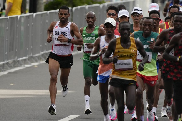 Tadesse Abraham, of Switzerland, competes during the men's marathon at the 2020 Summer Olympics, Sunday, Aug. 8, 2021, in Sapporo, Japan. (AP Photo/Shuji Kajiyama)