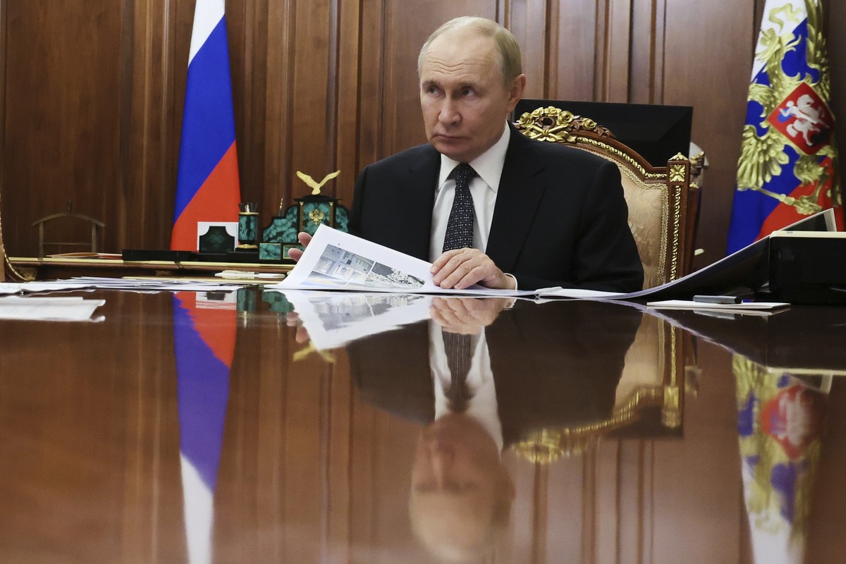Russian President Vladimir Putin listens to Vladimir Saldo, the Moscow-appointed head of the Russian-controlled Kherson region of Ukraine, during their meeting at the Kremlin in Moscow, Russia, on Tue ...