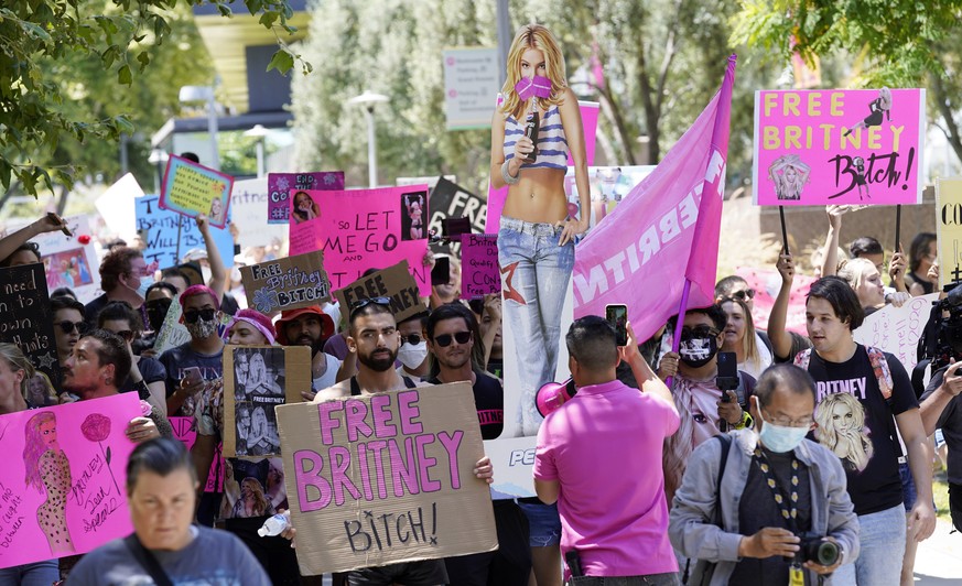 EDS NOTE: OBSCENITY - Britney Spears supporters march outside a court hearing concerning the pop singer&#039;s conservatorship at the Stanley Mosk Courthouse, Wednesday, June 23, 2021, in Los Angeles. ...
