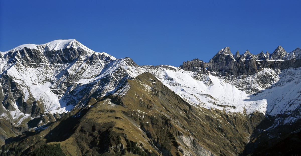 ARCHIVE - DUE TO THE PLANE CRASH ON THE MOUNT PIZ SEGNAS ---- Mount Piz Segnas, left, and the Tschingel Horn mountains, right, with the Martin's Hole near Elm in the canton of Glarus, Switzerland ...