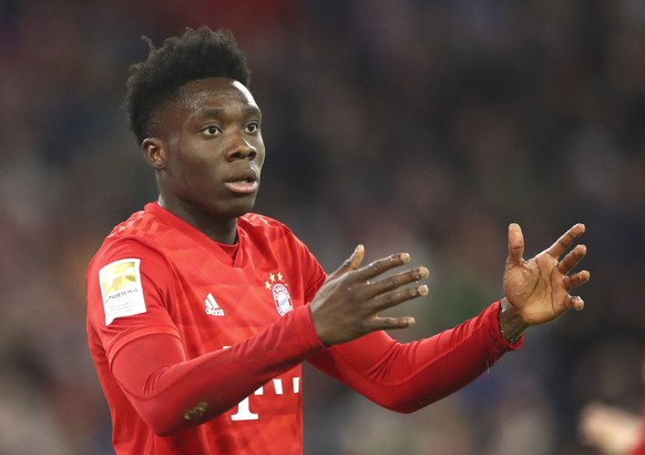 Bayern's Alphonso Davies reacts during the German Bundesliga soccer match between Bayern Munich and RB Leipzig at the Allianz Arena in Munich, Germany, Sunday, Feb. 9, 2020. (AP Photo/Matthias Sc ...
