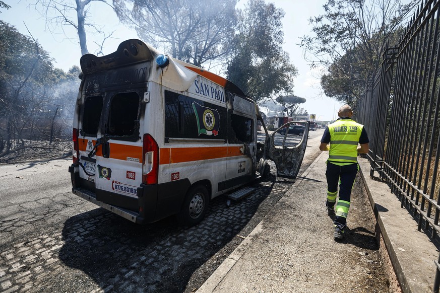 epa12214783 A damaged ambulance near the site of an explosion at a petrol station in via dei Gordiani, in Rome, Italy, 04 July 2025. At least 40 people have been injured in the explosion, ANSA reporte ...