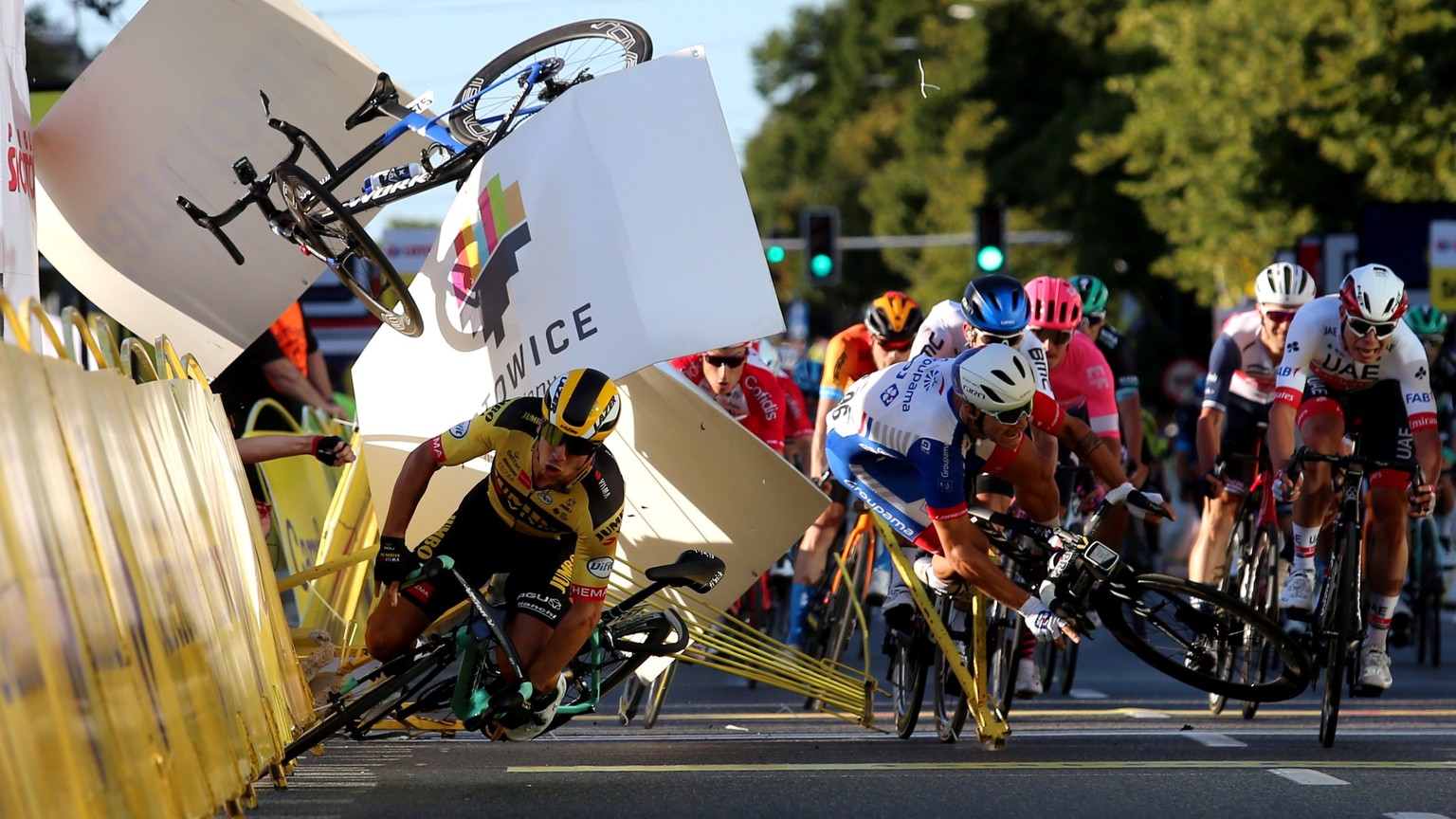 epa08585757 Riders fall near finish line during the 1st stage of Tour de Pologne cycling race, over 195.8 km between Chorzow and Katowice, southern Poland, 05 August 2020. EPA/ANDRZEJ GRYGIEL POLAND O ...