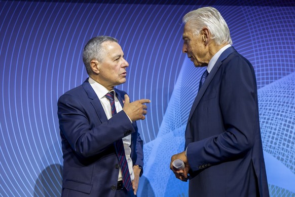 epa11654602 Ignazio Cassis (L), Swiss Federal Councillor and Minister of Foreign Affairs, speaks with Peter Brabeck-Letmathe (R), Chairman of the Board of Directors, GESDA, after a press conference at ...
