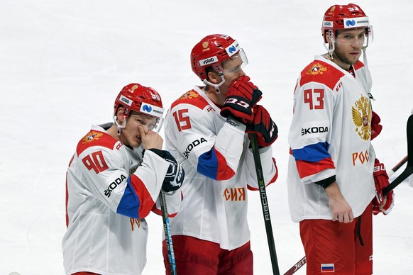 From left,Nikita Soshnikov, Pavel Karnaukhov and Artyom Sergeyev of Russia react after losing their match to Czech Republic after the Ice Hockey Euro Hockey Tour Karjala Cup match between Czech Republ ...