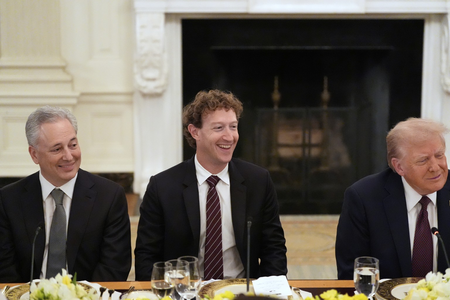 White House AI and crypto czar David Sacks, Facebook CEO Mark Zuckerberg and President Donald Trump listen during a dinner in the State Dinning Room of the White House, Thursday, Sept. 4, 2025, in Was ...