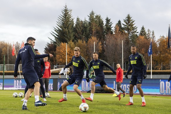 epa07093264 Swiss players attend a training session at the Laugardalsvoellur stadium in Reykjavik, Iceland, 14 October 2018. Switzerland will face Iceland in their UEFA Nations League soccer match on  ...