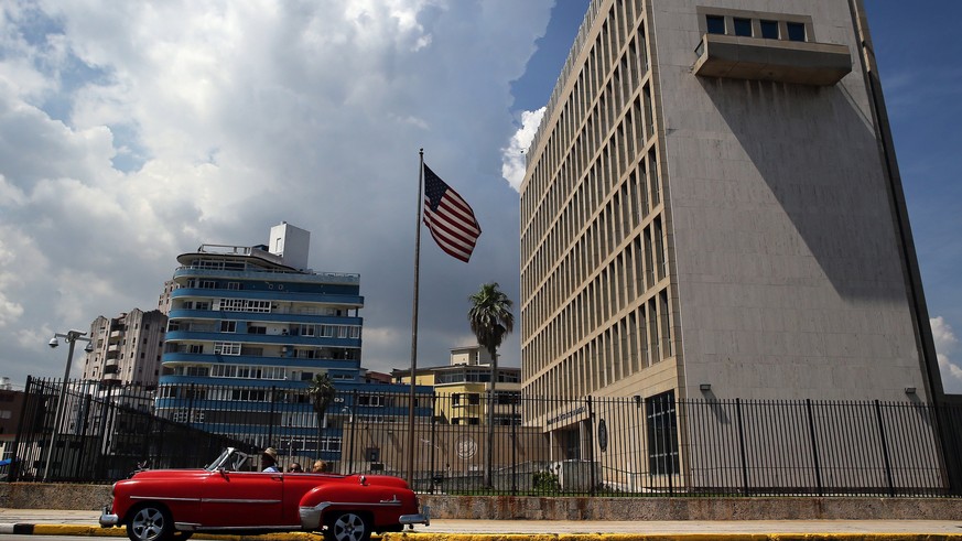 epa06234538 (FILE) - A classic car passes in front of the Embassy of the United States of America in Havana, Cuba, 16 June 2017 (reissued 29 September 2017). Media reports on 29 September 2017 state t ...