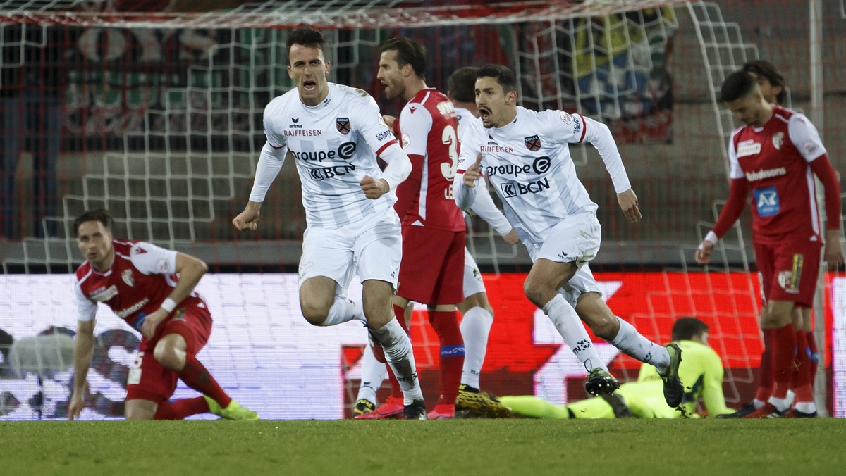 Xamax's defender Arbenit Xhemajli, left white, celebrates his goal, after scoring the 1:2, during the Super League soccer match of Swiss Championship between FC Sion and Neuchatel Xamax FCS, at t ...