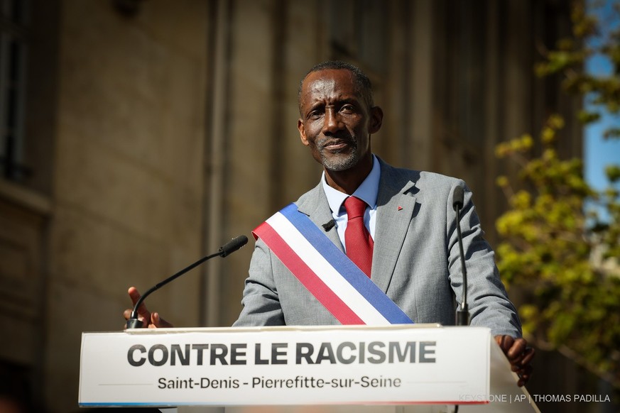 New Saint-Denis mayor from the far-left party La France Insoumise (LFI) Bally Bagayoko speaks at the rally against racism in Saint-Denis near Paris Saturday April 4, 2026, in Saint-Denis. (AP Photo/Th ...