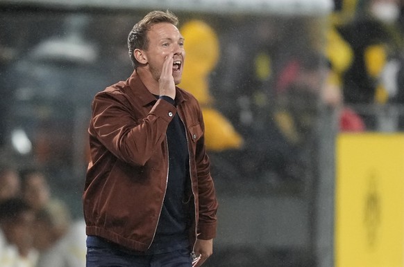 Bayern&#039;s head coach Julian Nagelsmann shouts to his players from the sidelines during the German Supercup soccer match between Borussia Dortmund and Bayern Munich in Dortmund, Germany, Tuesday, A ...