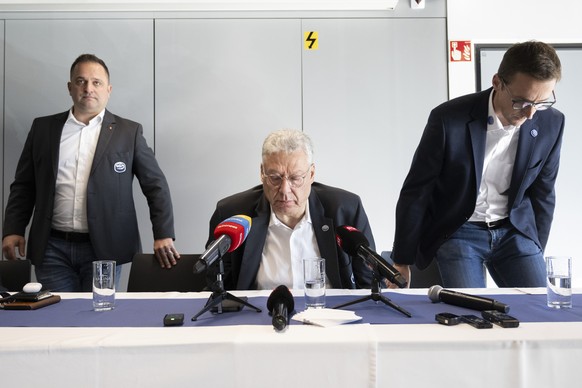 From left, Paolo Duca Sports Director, The President of HC Ambri Piotta Filippo Lombardi and Head Coach Luca Cereda, during the press conference at the ice stadium Gottardo Arena in Ambri, Switzerland ...
