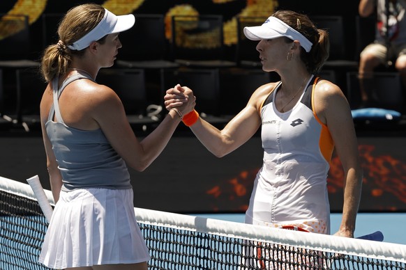 Danielle Collins, left, of the U.S. is congratulated by Alize Cornet of France following their quarterfinal match at the Australian Open tennis championships in Melbourne, Australia, Wednesday, Jan. 2 ...