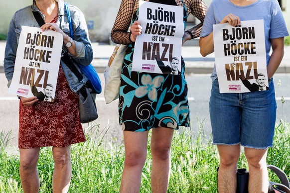 epa11438471 Protesters demonstrate with a banner reading &#039;Bjoern Hoecke is a Nazi&#039; in front of the court building as Hoecke (not pictured), former history teacher and current leader of the f ...