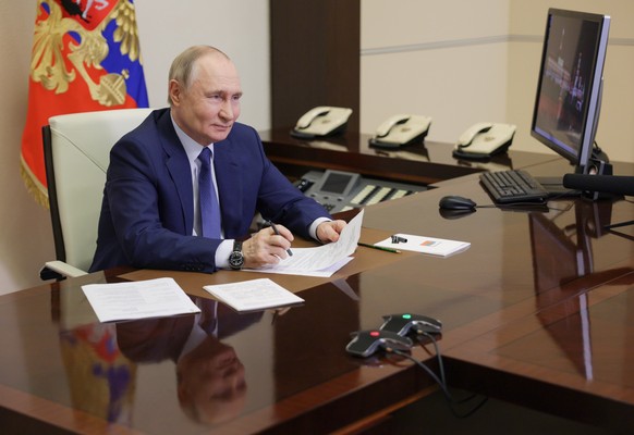 epa12202732 Russian President Vladimir Putin attends a ceremony to open new youth centres in Russian regions via videoconference at the Novo-Ogaryovo state residence, outside Moscow, 28 June 2025. New ...