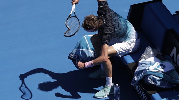 Germany's Alexander Zverev smashes his racket in frustration during his fourth round match against Canada's Milos Raonic at the Australian Open tennis championships in Melbourne, Australia, Monday, Jan. 21, 2019. (AP Photo/Kin Cheung)