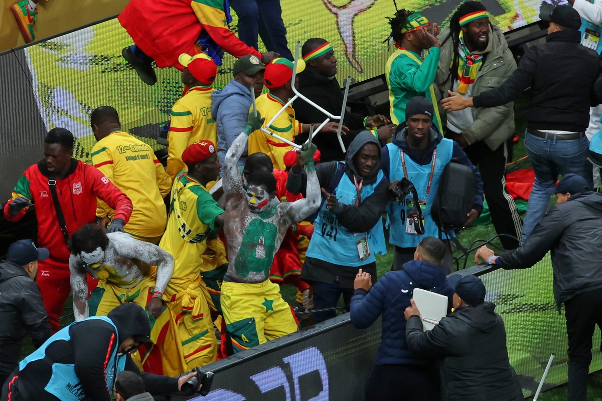 Senegal supporters protest after a controversial penalty was awarded to Morocco late on during the Africa Cup of Nations final soccer match between Senegal and Morocco in Rabat, Morocco, Sunday, Jan.  ...