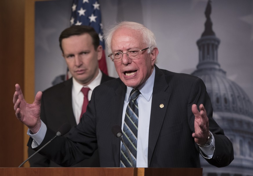 Sen. Bernie Sanders, I-Vt., joined at left by Sen. Chris Murphy, D-Conn., holds a news conference after the Senate passed a resolution he introduced that would pull assistance from the Saudi-led war i ...