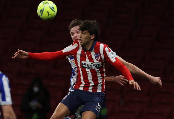 epa09195400 Atletico Madrid� ?s forward Joao Felix (front) in action during the Spanish LaLiga soccer match between Atletico de Madrid and Real Sociedad at Wanda Metropolitano stadium in Madrid, Spain ...