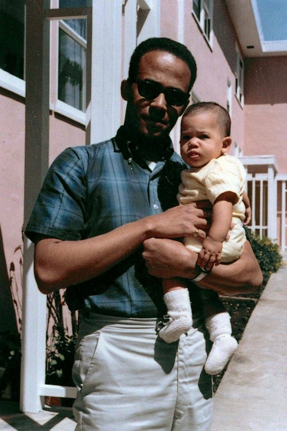 Kamala Harris with her father Donald, 1965 Donald Harris holds his daughter Kamala, April 1965., PUBLICATIONxNOTxINxUKxFRAxUSA Copyright: xKamalaxHarrisxcampaignx/xAvalonx 0891398899