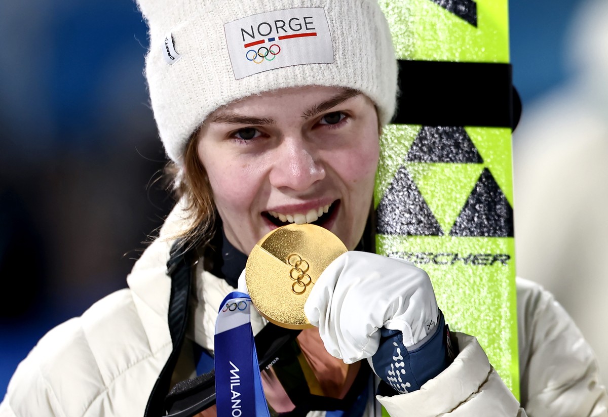 epa12744703 Gold medalist Anne Odine Strom of Norway poses with her medal during the medal ceremony for the Women's Large Hill of the Ski Jumping competitions at the Milano Cortina 2026 Winter Ol ...