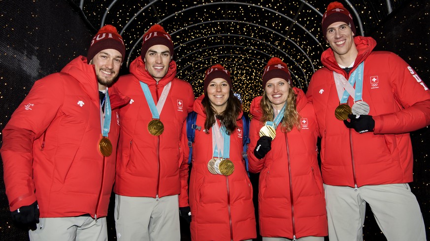Frome left to right, Luca Aerni, Daniel Yule, Wendy Holdener, Denise Feierabend, Ramon Zenhaeusern, pose at the House of Switzerland after the Alpine Skiing Team event during the XXIII Winter Olympics ...