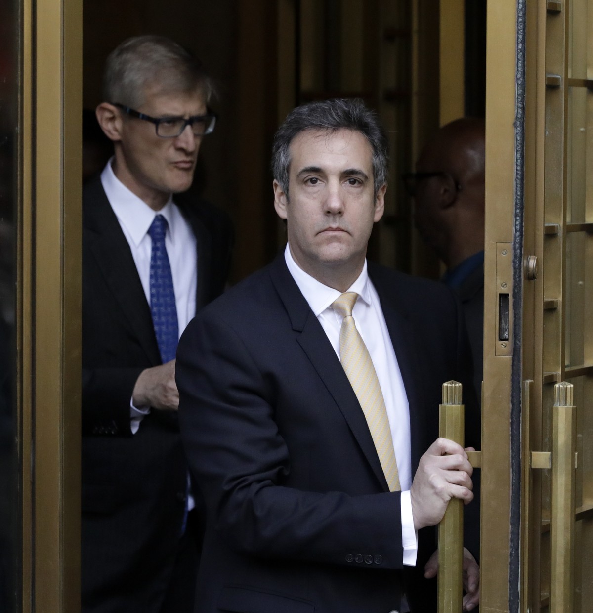 epaselect epa06963216 Michael Cohen (C), President Donald Trump's personal attorney leaves following a hearing at United States Federal Court in New York, New York, USA, 21 August 2018. Former at ...