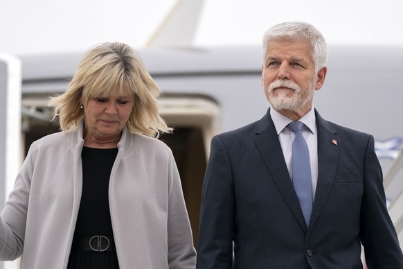epa11702280 Petr Pavel (R), President of the Czech Republic, and his wife, Eva Pavlova, get off the plane at the Zurich Airport in Kloten, Switzerland, 05 November 2024. The Czech president is on a st ...