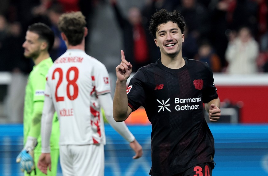 epa12512229 Ibrahim Maza of Leverkusen celebrates after scoring the 6-0 lead during the German Bundesliga soccer match between Bayer 04 Leverkusen and 1. FC Heidenheim in Leverkusen, Germany, 08 Novem ...